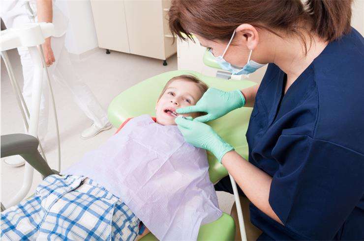 герметизация зубов у детей